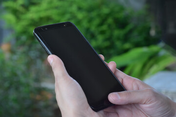 mobile phone People are using their phones online.