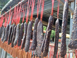 rope on a fence, Dry beef in the market, Sausage, Lao Food