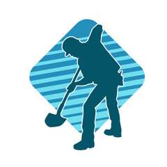 Silhouette of a worker carrying shovel tool. Silhouette of a worker in action pose using shovel tool.
