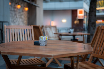Tables and chairs in outside cafe