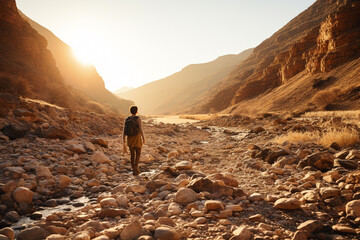 fresh and pure human with During golden hour, sun creates long shadows over textured and rugged landscape, showcasing raw beauty of a dry riverbed