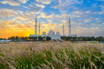 Aluminium Prints Abu Dhabi The Sheikh Zayed Grand Mosque, the largest mosque in the UAE, as the sun sets behind, in Abu Dhabi, United Arab Emirates.