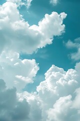 Naklejka na ściany i meble Blue sky background with clouds and wind