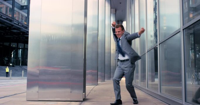 Man, dancing and office for celebration, goals and happy with career achievement. Excited, entrepreneur, and professional for promotion, success and opportunity for profit at job in Cape Town