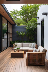 Contemporary outdoor lounge in backyard Terrace house with wooden floor comfy seating and wicker ottoman Cozy patio or balcony space for relaxation Wooden veranda with outdoor furniture copy space