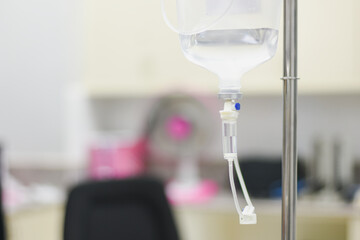 Giving saline drips intravenously in the hospital
