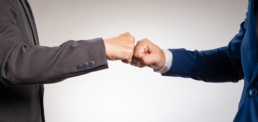 Hand of people working fist bump assemble corporate meeting teamwork and business competition...