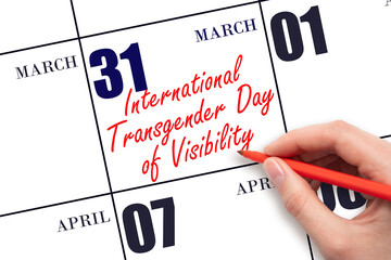 March 31. Hand writing text International Transgender Day of Visibility on calendar date. Save the...
