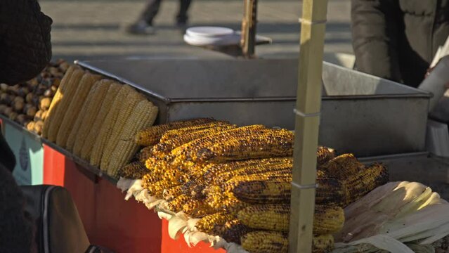 Istanbul bagel simit seller and his bagels on the counter