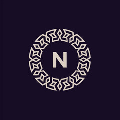 logo initials letter N. elegant and modern circle emblem.