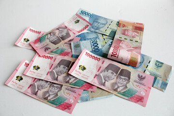 Cash payment concept. Indonesian rupiah currency. One hundred thousand rupiah and fifty thousand rupiah.