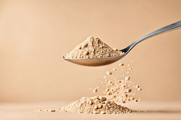 Nutrient rich protein powder on a spoon isolated.