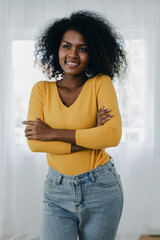 Portrait of African American woman with bushy curly hairstyle. young african american female