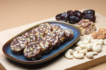 Khajur Barfi Or Khajoor Dry Fruits Burfi Made Of Dates, Anjeer, Kaju, Cashew Nuts, Raisins, Kismis, Pista, Poppy Seeds, Almonds, Pistachio, Badam, Mawa Are Rich In Dietary Fiber, Proteins And Vitamins