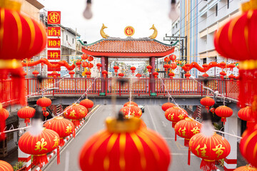 Naklejka premium Chinese New Year is celebrated in the capital. and decorated Chinese lanterns with characters written to mean good fortune hung on the walkway of the overpass. Outstanding and beautiful Chinatown area