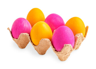Side view of carton box with vibrant colourful easter eggs painted in bright pink and yellow dye isolated on white background boiled and prepared for traditional holiday celebration as food and gift