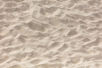 Obraz premium White sand in the desert as an abstract background. Texture