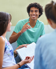 Obraz premium Students, studying and planning for education, learning and discussion of knowledge and group project. Young people or friends with questions, problem solving and reading books for collaboration