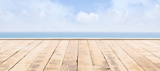Wooden pier, exotic sea and a blue sky. Beautiful summer background. Vacation and traveling.