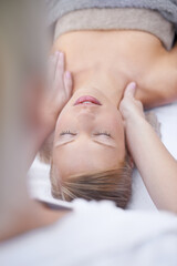 Young woman, relax and massage in spa for health, wellness and peace with hands for shoulder pain....