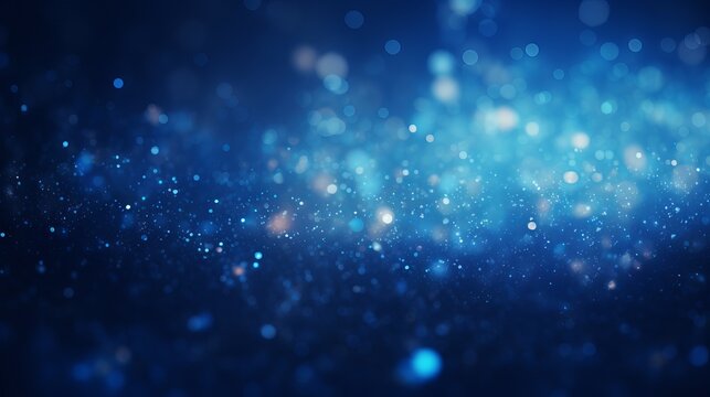 Blue glowing particles on dark background with bokeh effect