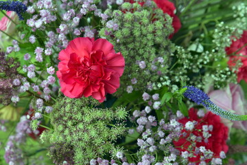 Obraz na płótnie Canvas Beautiful mixed flower bouquet, red carnation. 
