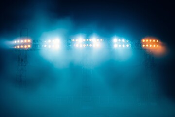 Vibrant Stadium Lights Pierce Through The Thick Mist, Creating An Electric Atmosphere