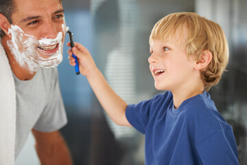Help with shaving, dad and child with razor, cream on face and bonding in home with morning...