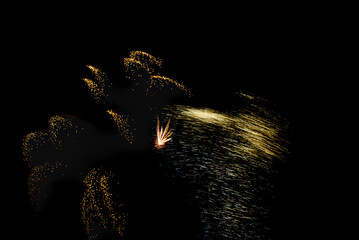 Fireworks lighting up the night sky. Pyrotechnics, abstract