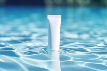 White blank cosmetic bottle tube mock up lies on the water surface - obrazy, fototapety, plakaty