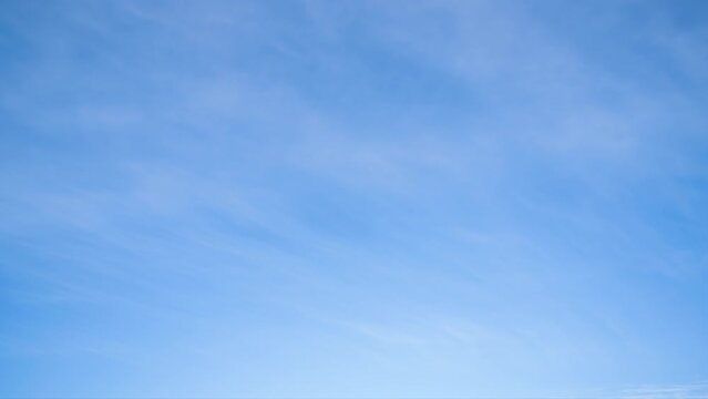 beautiful blue sky with soft white clouds timelapse for abstract background