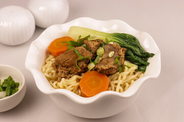 Taiwanese Beef Noodle Soup with Bok Choy and Carrot.