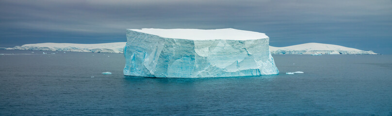 Large iceberg stranded at the entrance of Paradise Harbor, Paradise Bay, Gerlach Straight, Antarctica