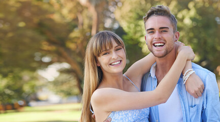 Fototapeta premium Portrait, hug and couple in a park, love and romantic with relationship and bonding together. Face, man and woman with marriage and embrace with happiness and outdoor for a date with weekend break