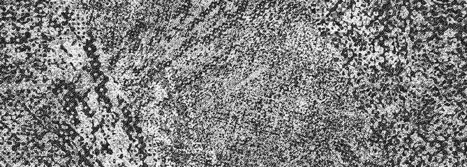 An abstract black and white halftone grunge texture background image.
