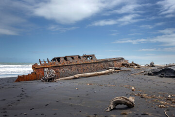  S.S. Waitangi shipwreck. Rusty shipwreck at Mana Bay New Zealand. Patea. Taranaki. Tasman Sea....