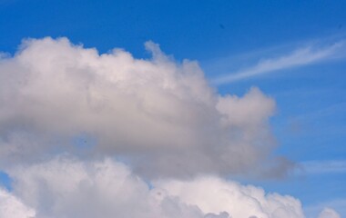 photo of white sky and bright blue clouds