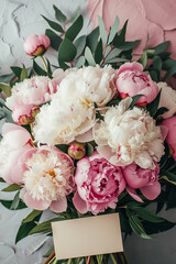 postcard in a bouquet of peonies mockup