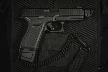 Tactical pistol g19 with muzzle brake and safety cord.