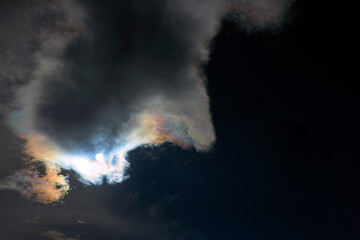 Fototapeta na wymiar Dark clouds and sunlight. Interference