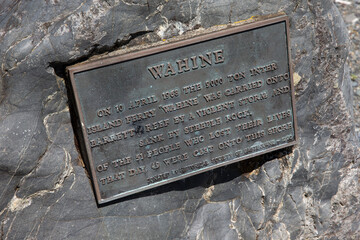 Foremast of the TEV Wahine. Monument of ship disaster. Camp Bay. Wellington Harbour area. Coast. Memory plaque