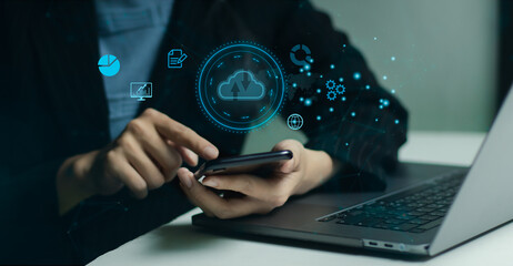 Business person using smartphone and laptop computer connecting cloud data to download and upload file and folder. Technology concept.