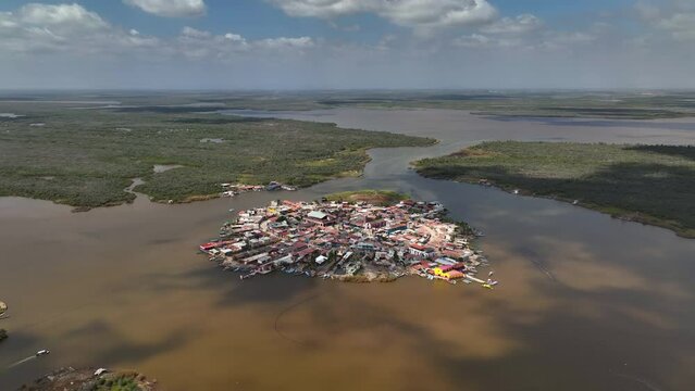 Aerial view rising around the Mexcaltitan village, in sunny Nayarit, Mexico