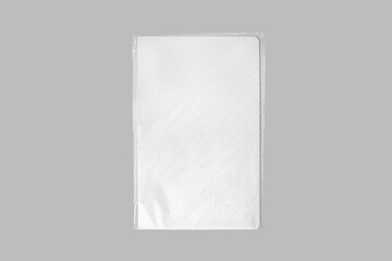Brand New white leather fabric hardcover notebook in a transparent cellophane wrapper. Mockup isolated on background. 3d rendering.