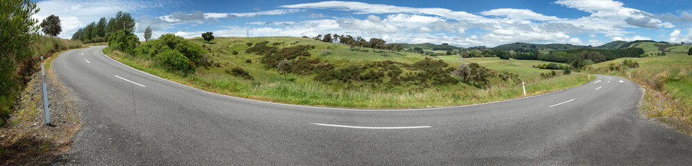 Country road near Carterton. New Zealand. Rural. Meadows and hills. Spring. Typical New Zealand...