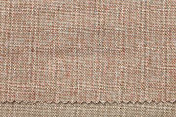 Background image - texture of upholstery fabric in two shades of beige