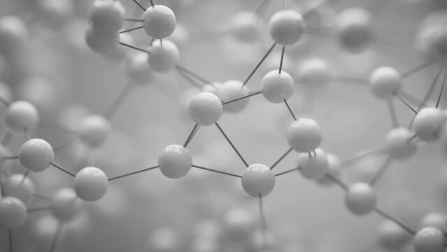 Smooth movement of a geometric shape animated in space in the form of a molecular lattice.