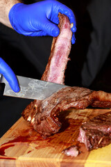 meaty beef steak into bones