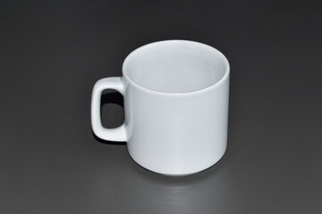 White cup isolated on gray background