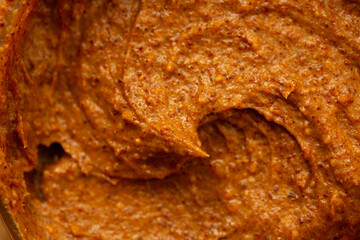 Baby food, vegetable puree close-up. Apple-carrot puree chopped in a blender. Background texture of food for newborn children.